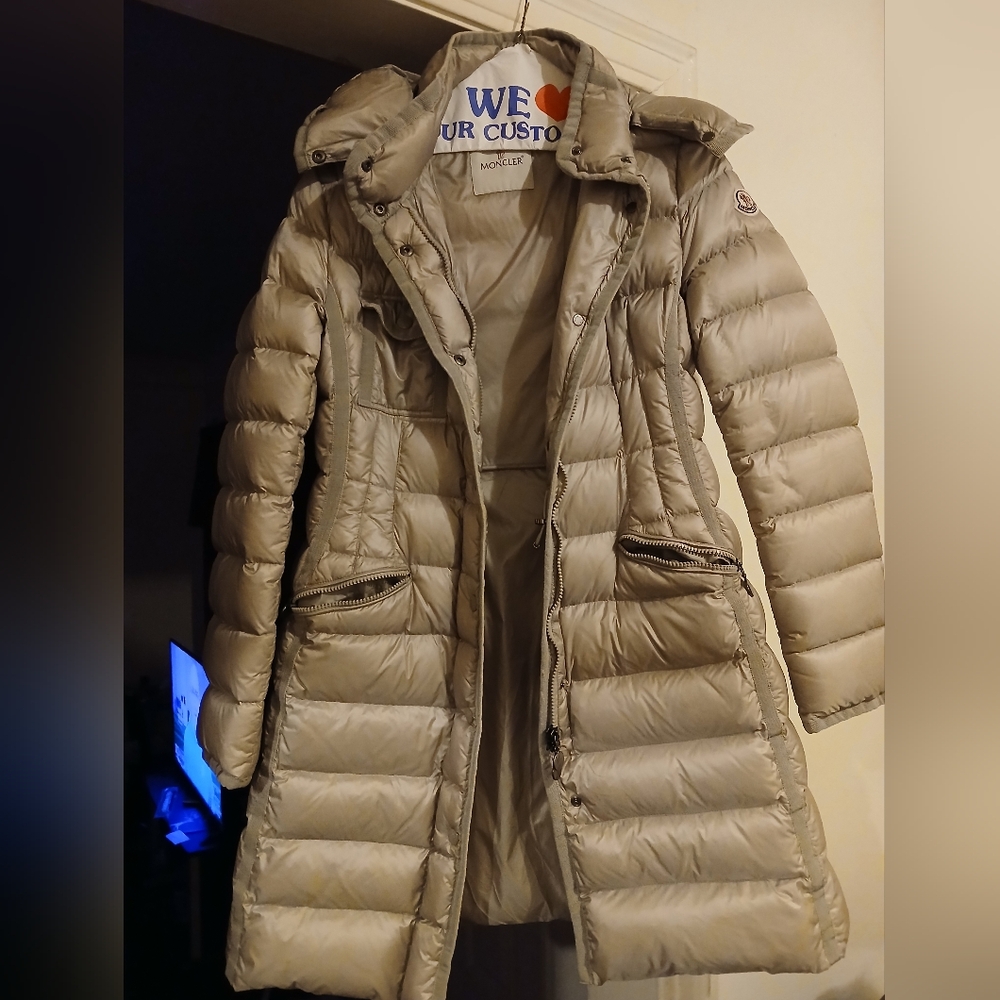 Moncler coat gently used hardly worn, great condition. Size 2/M beige or tan